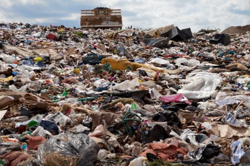 Workers managing construction debris